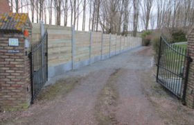 Réalisation d’une clôture mixte poteaux béton/lames bois à Saint jans Cappel